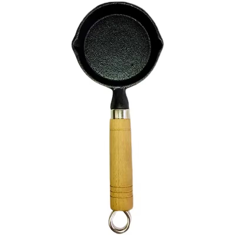 Olajfröccsent tészta kanál forró edény mini öntöttvas főtt olaj olajfoltos kis vasedény